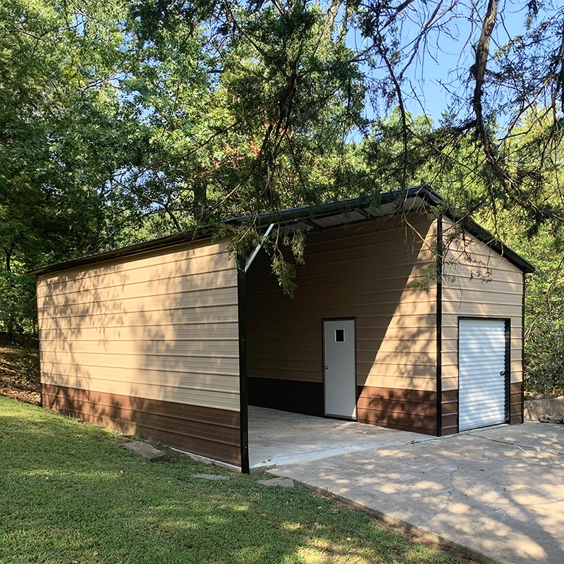 Image of tan colored utility building with carport.