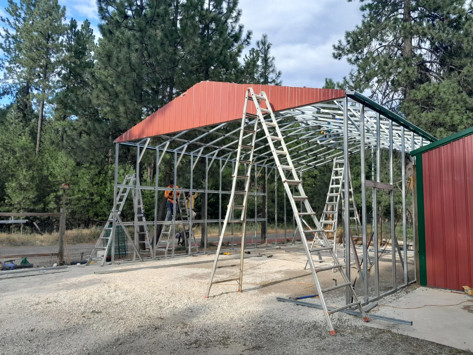 The crew assembling a custom RV and Boat Carport