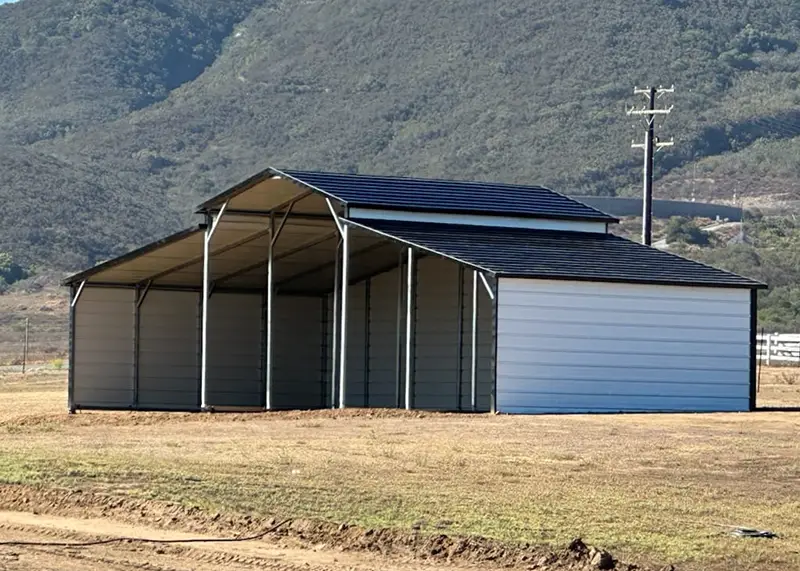 open metal barn in desert