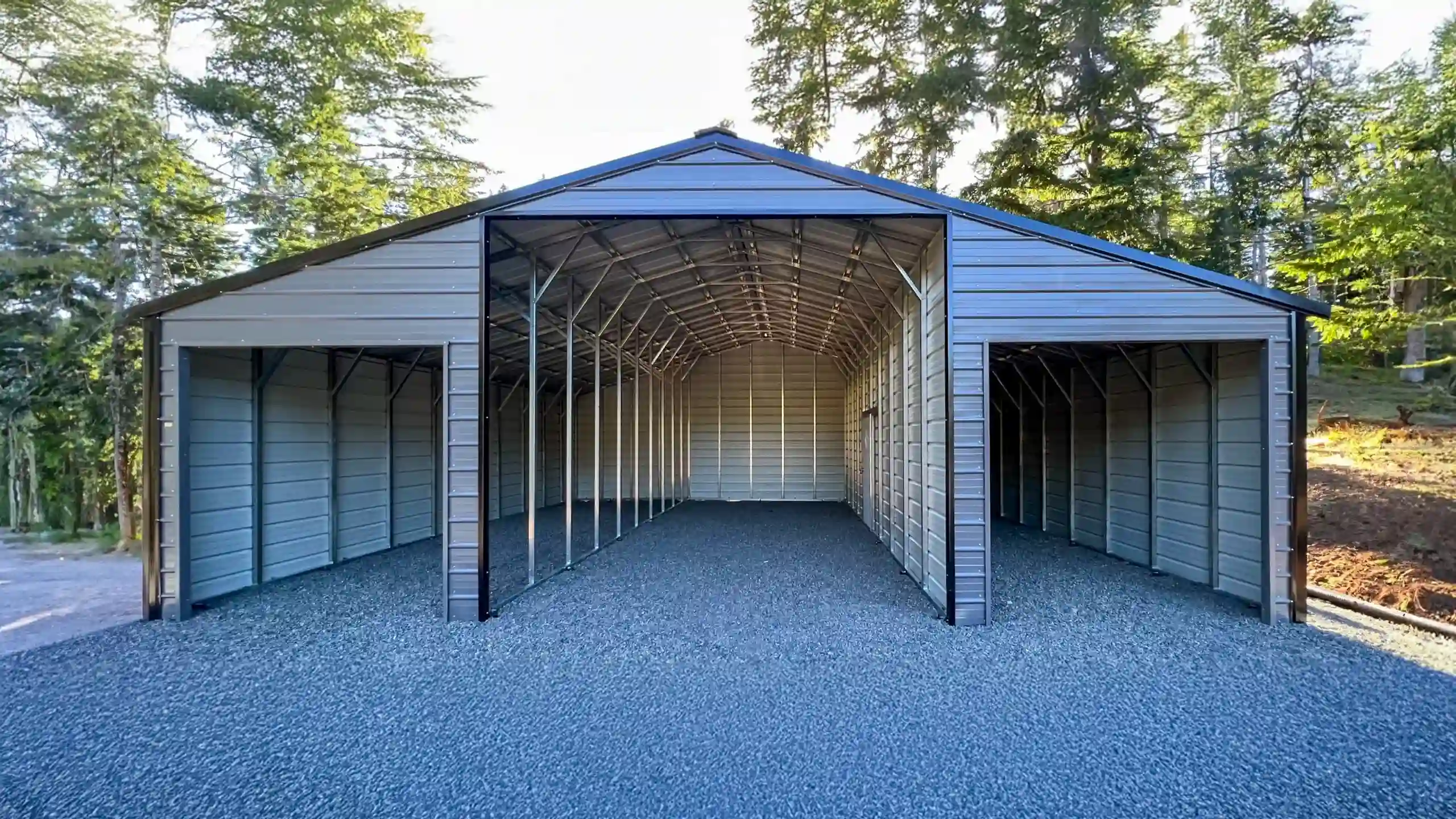 gray open barn with three doors
